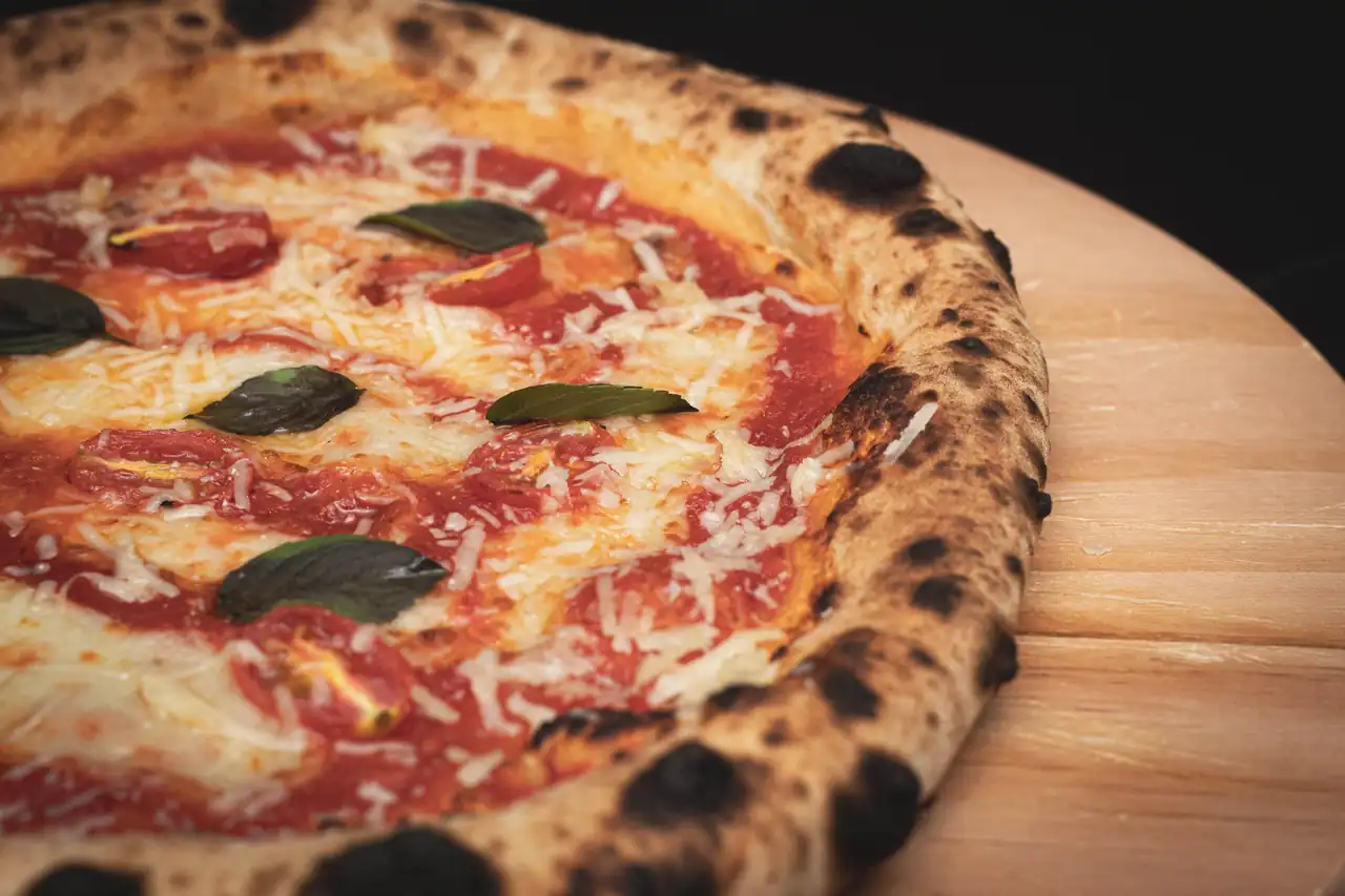 Classic Margherita pizza with basil leaves