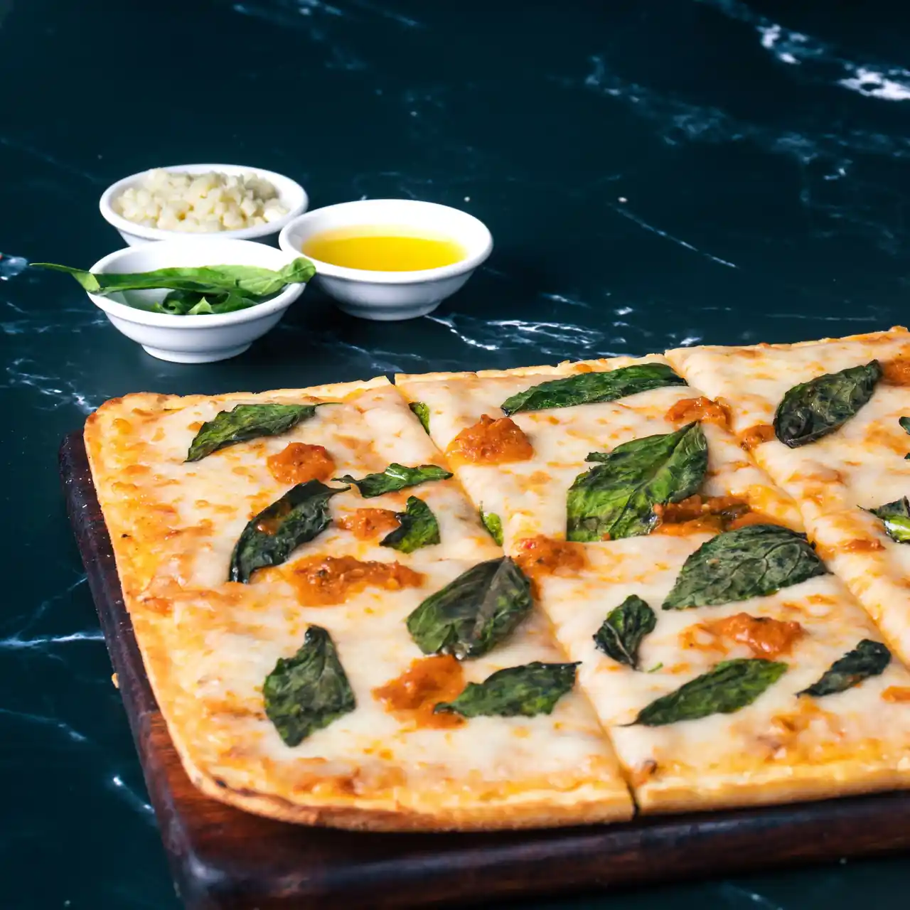 Fresh artisan pizza slice with blistered crust and melting cheese