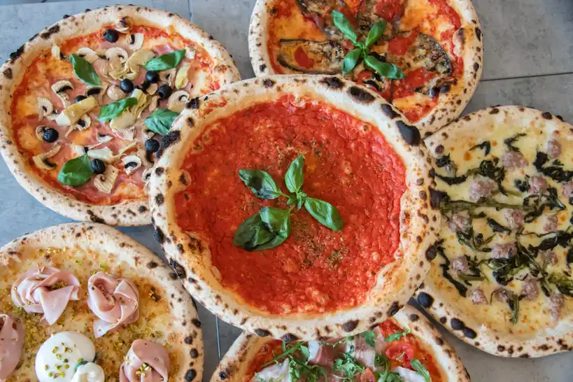 Gourmet four cheese white pizza topped with herbs