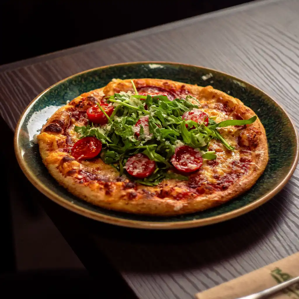 Cherry tomato and basil pizza with shaved parmesan