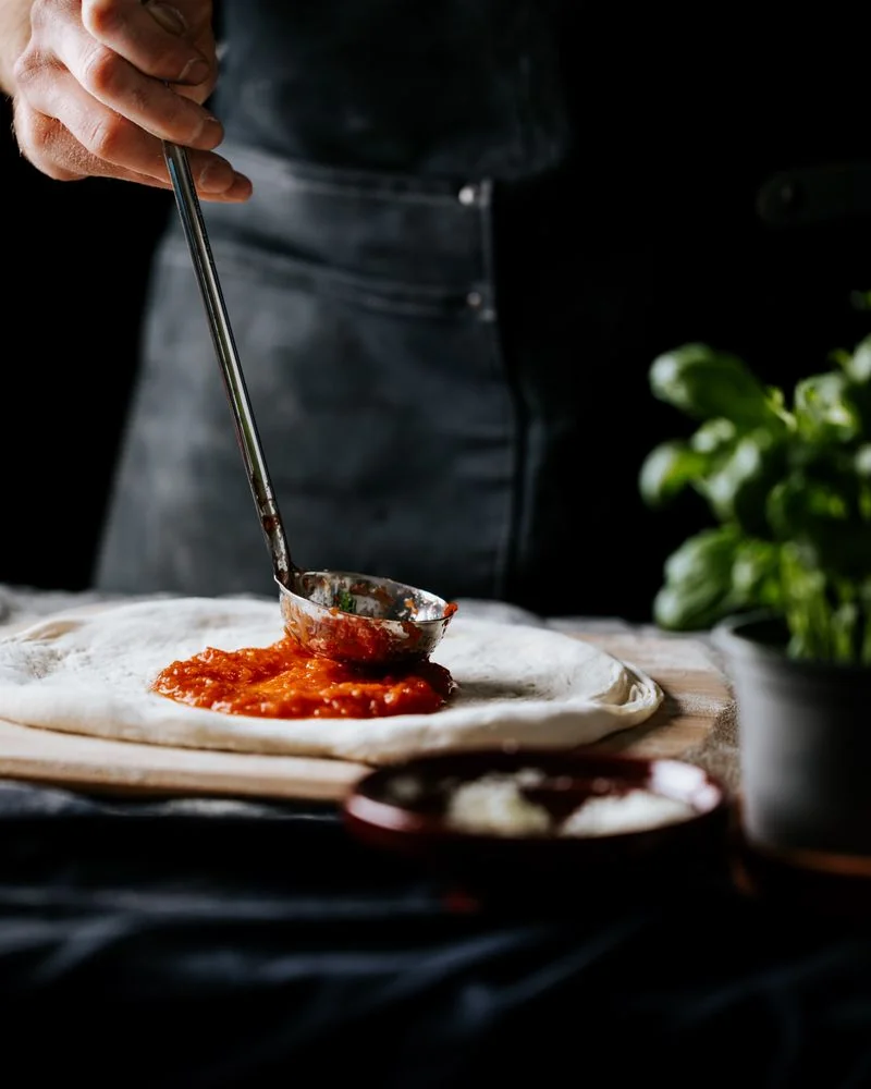 Cold pressed extra virgin olive oil drizzle over freshly prepared ingredients